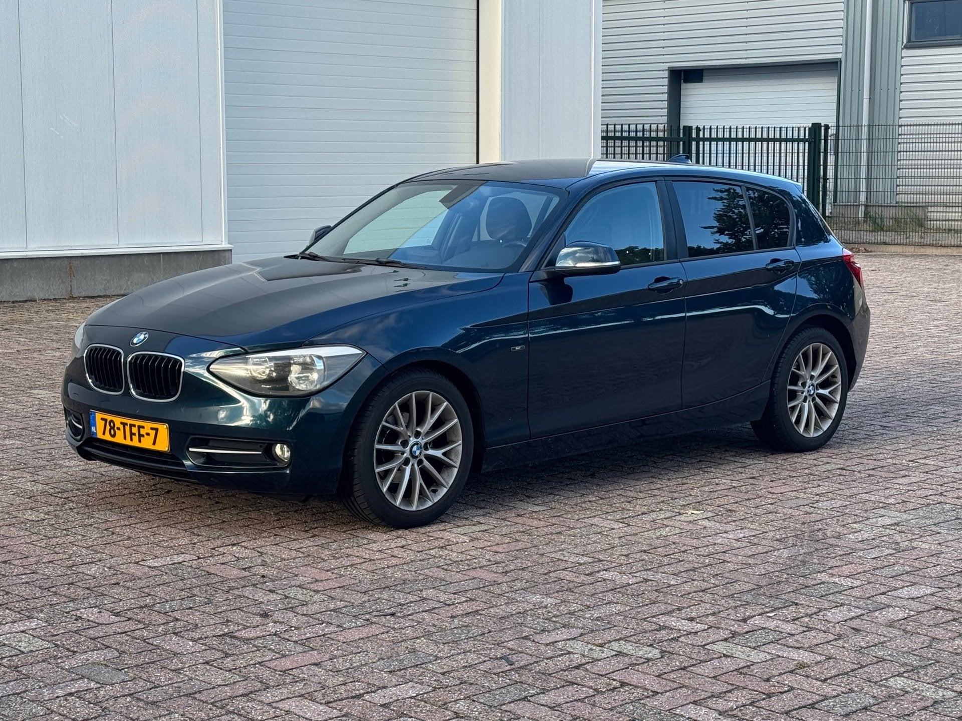 BMW 1-serie 116i Business+ Sport, Auto's, 1-Serie, Euro 5, Gebruikt, Zwart