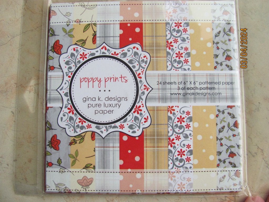 NIEUWSTAAT papier GINA K. Designs luxury paper POPPY PRINTS, Hobby en Vrije tijd, Ophalen of Verzenden, Zo goed als nieuw, Overige thema's