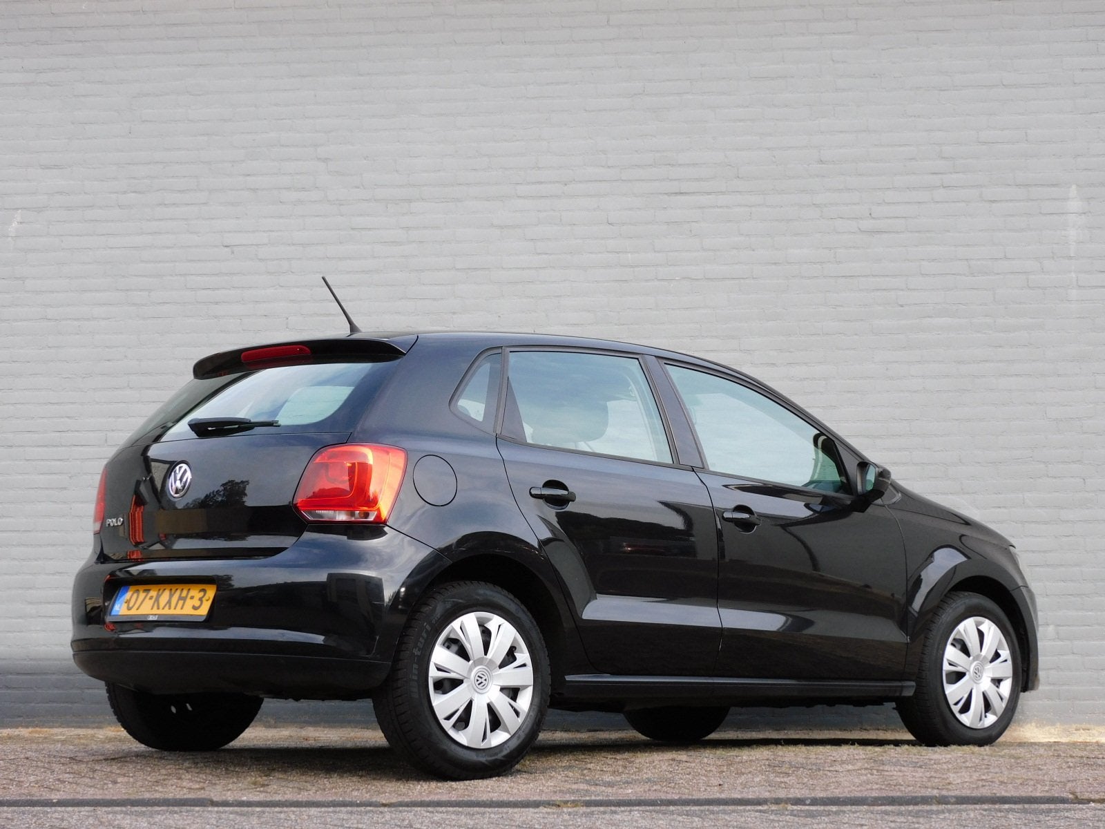 Volkswagen Polo 1.2-12V Comfortline NAVI! BLUETOOTH! CRUISE!, Auto's, Voorwielaandrijving, Euro 5, Zwart, Verwarmde buitenspiegels