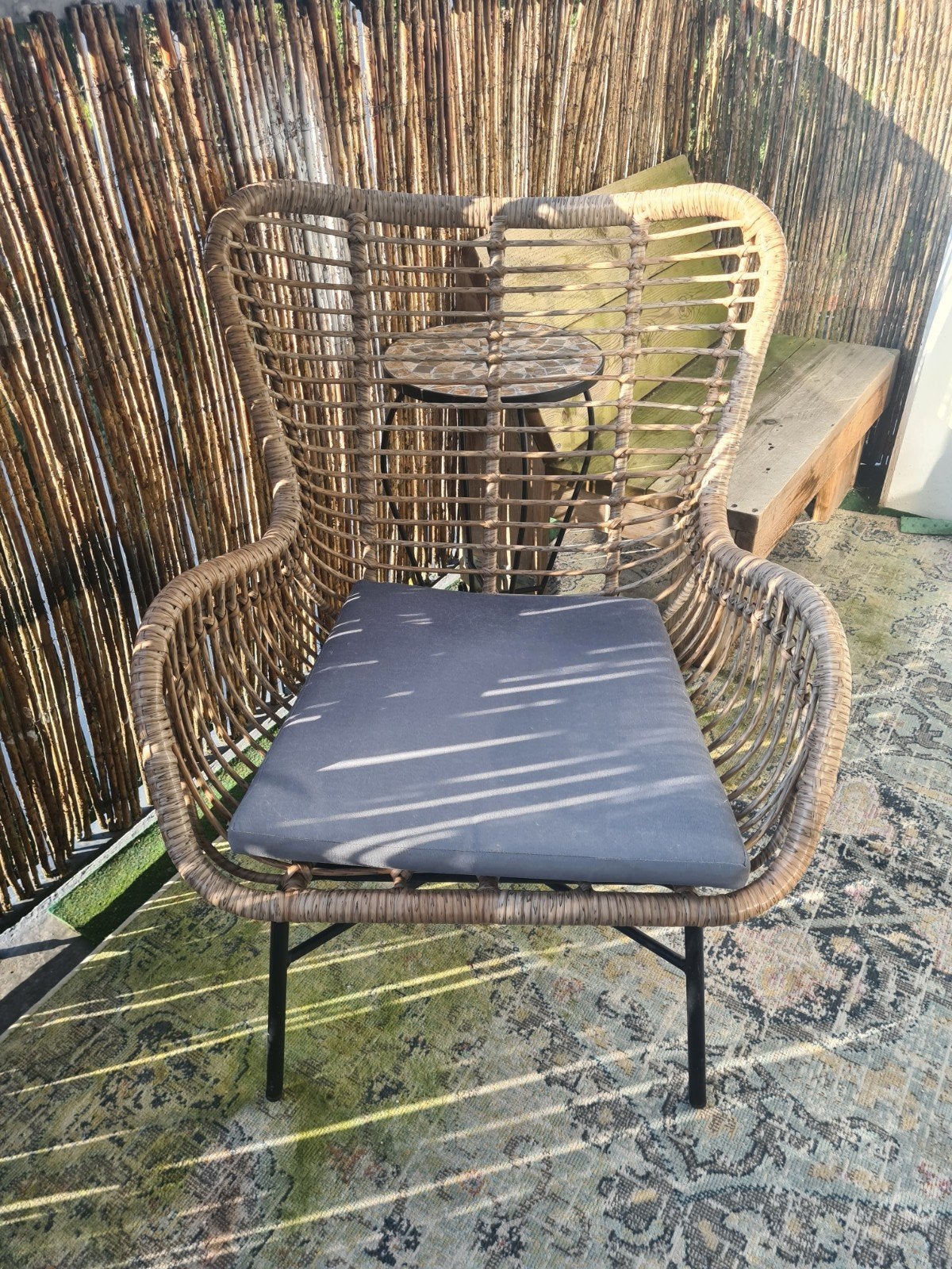 rieten tuinstoel met kussen
