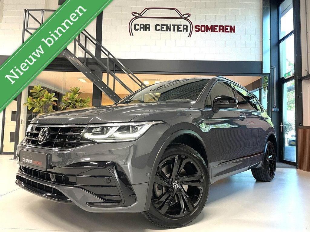 Volkswagen Tiguan 1.4 TSI eHybrid R-Line Business+ Black Sty, Auto's, Volkswagen, 1716 kg, 4 cilinders, Met garantie (alle), Leder en Stof