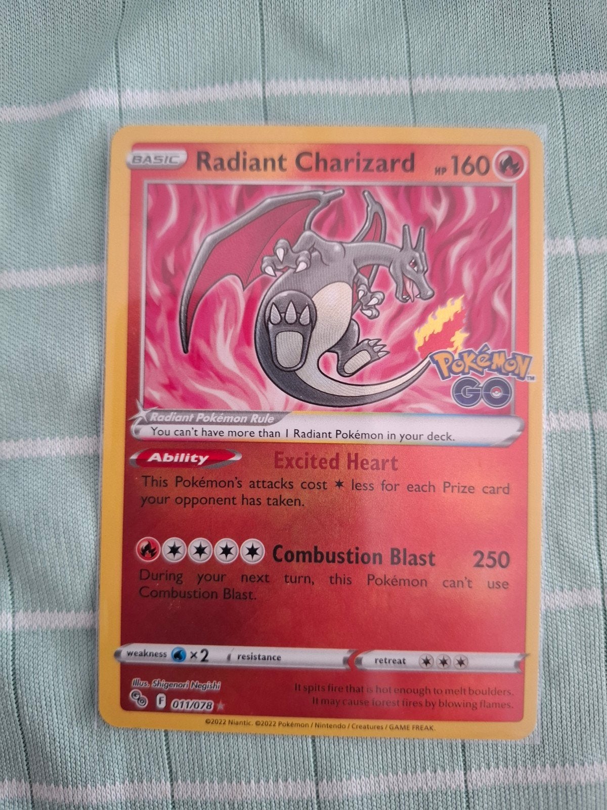Pokemon Go Radiant Charizard 011, Ophalen of Verzenden, Zo goed als nieuw