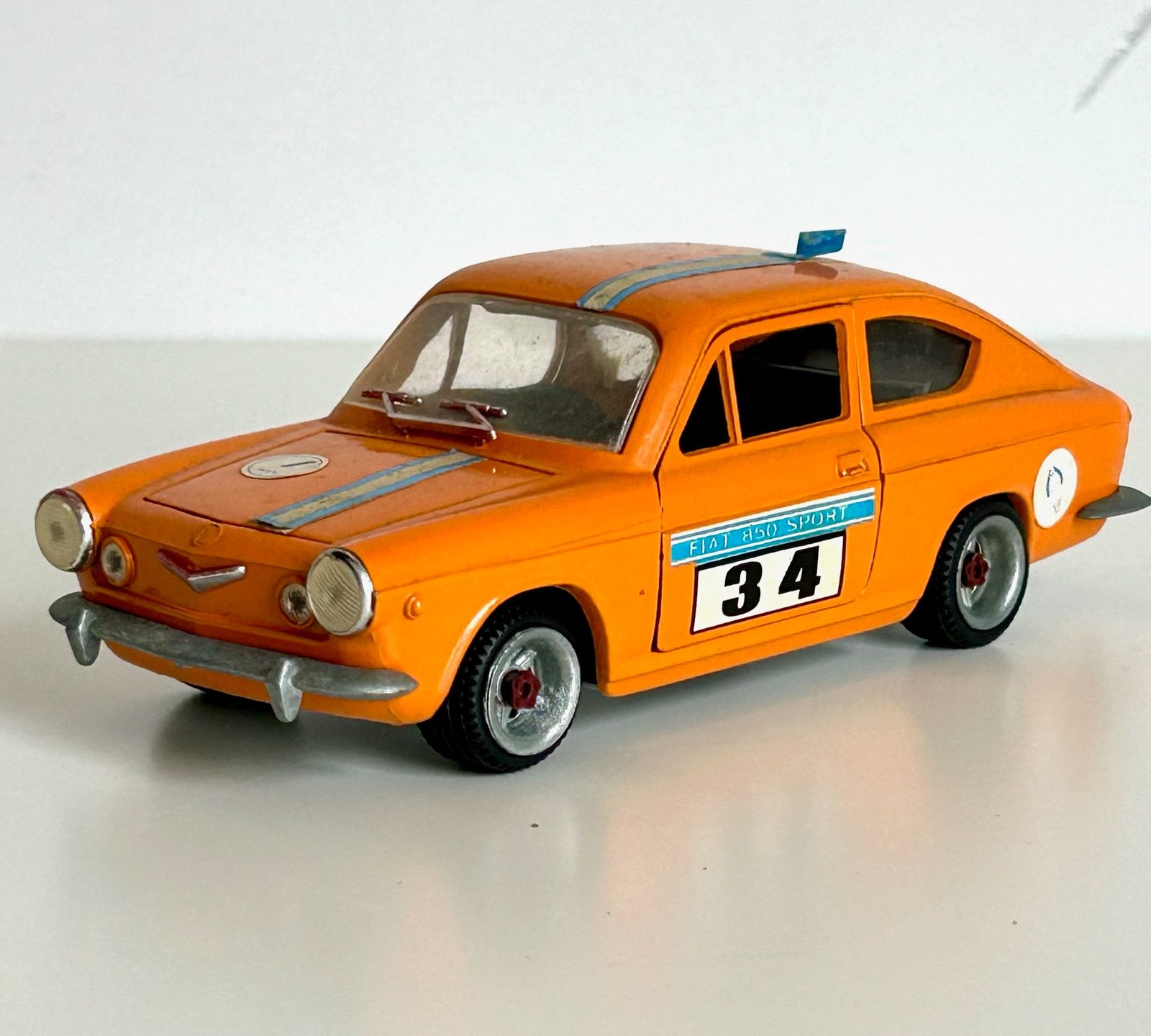 Vintage Nacoral Fiat 850 Sport Coupé 1:24 – oranje nr. 34, Ophalen of Verzenden, Gebruikt, Auto, Overige merken