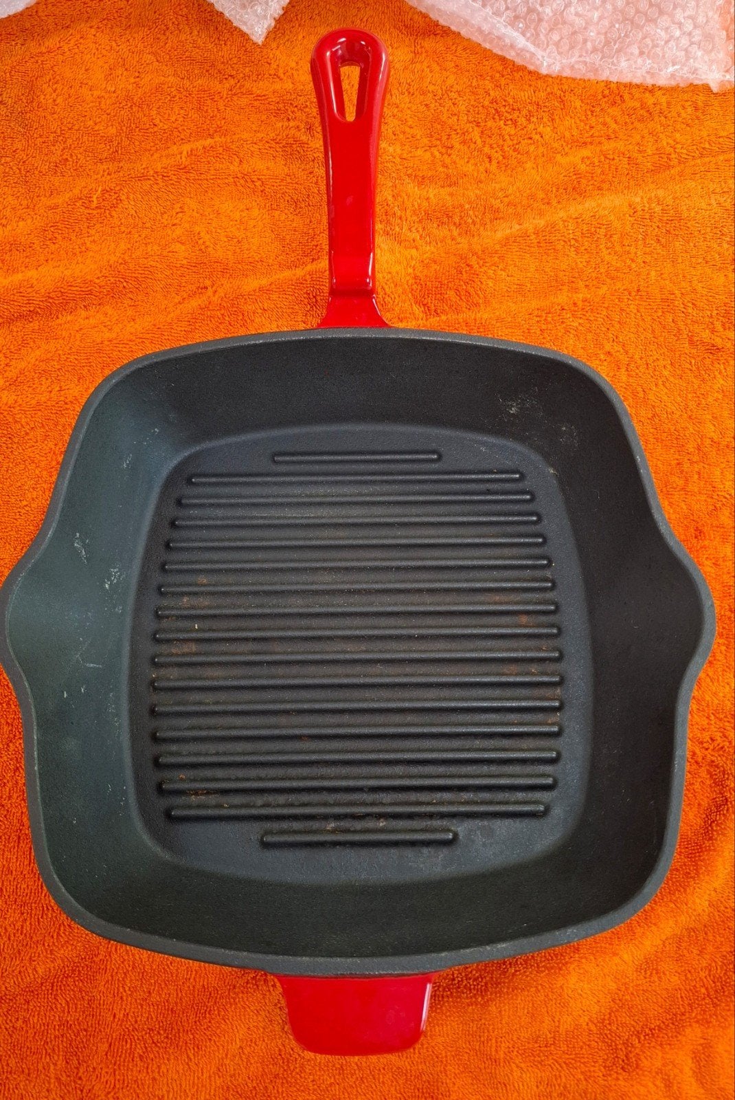 Gietijzeren grillpan met rode handgreep, Ophalen of Verzenden, Gebruikt, Gietijzer
