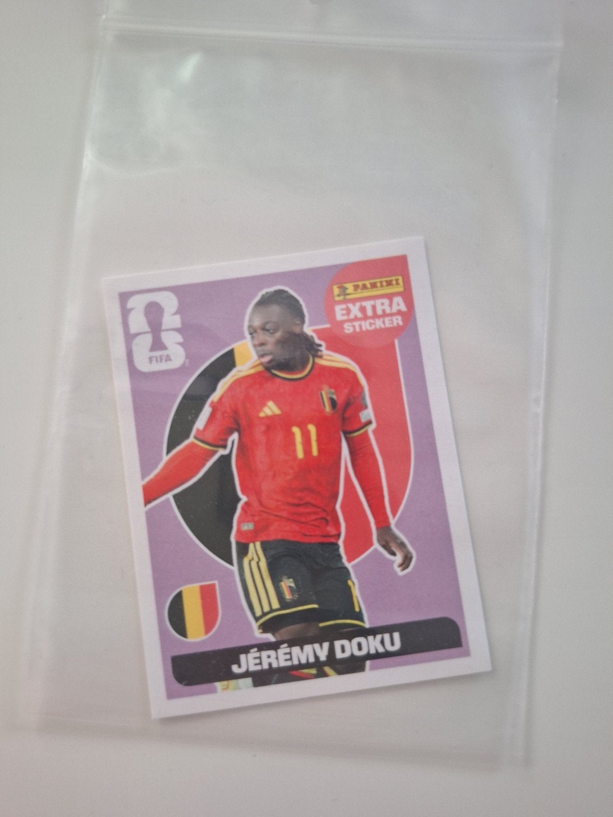 Panini FIFA Extra Sticker Jérémy Doku paars, Ophalen of Verzenden, Nieuw, Sport