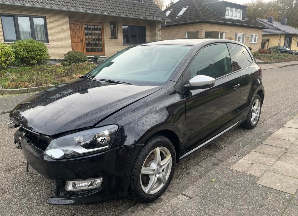 Volkswagen polo 1.2 tsi black edition lichte schade, Voorwielaandrijving, Euro 5, Stof, Zwart