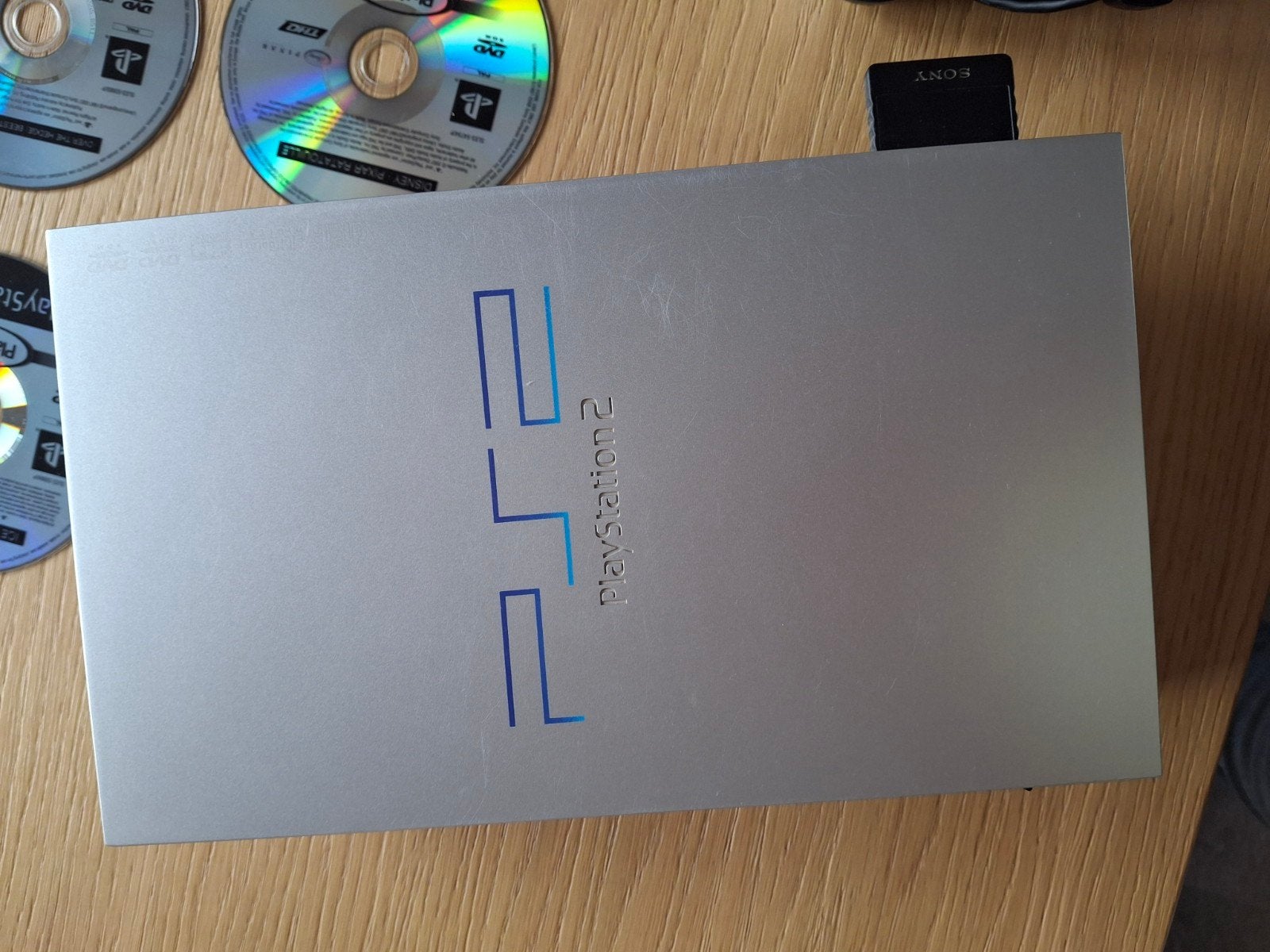 PlayStation 2 Slim met 1 controller en 25 games, Ophalen of Verzenden, Met 1 controller, Zilver, Slim