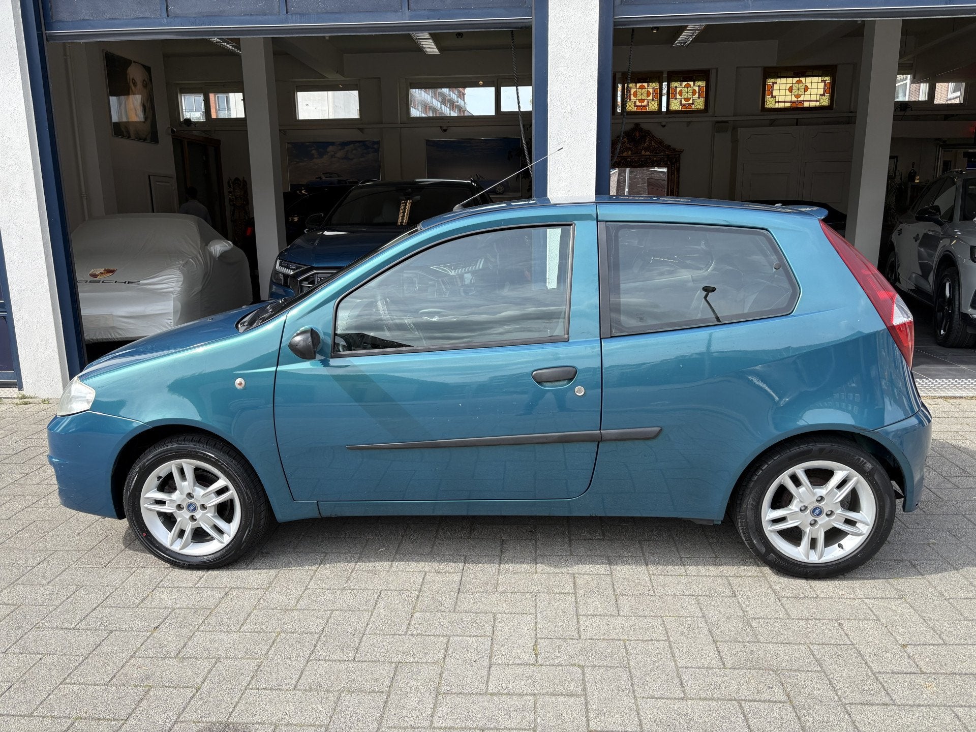 Fiat Punto 1.2-16V SportSound AIRCO/L.M VELGEN (bj 2005), Auto's, Voorwielaandrijving, Gebruikt, 4 cilinders, Origineel Nederlands