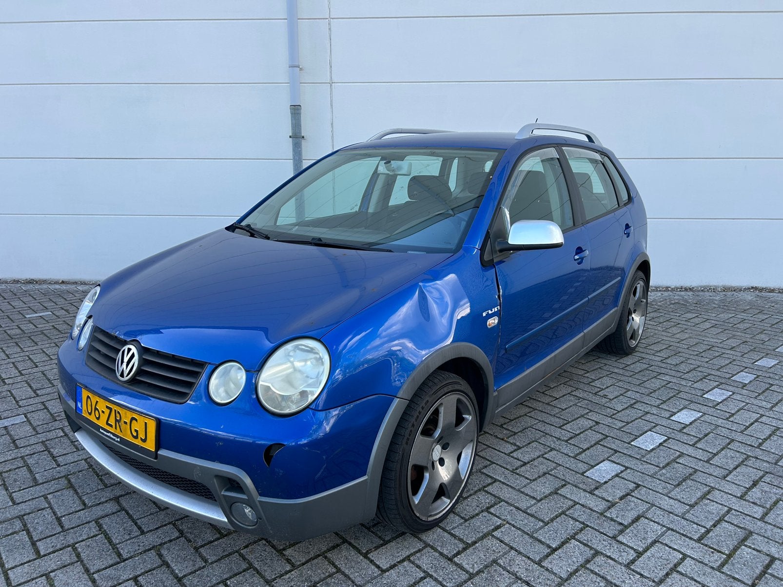 Volkswagen CrossPolo 1.2 2005 Blauw Fun Airco Cruise Camera, Stof, 1064 kg, Blauw, 1198 cc