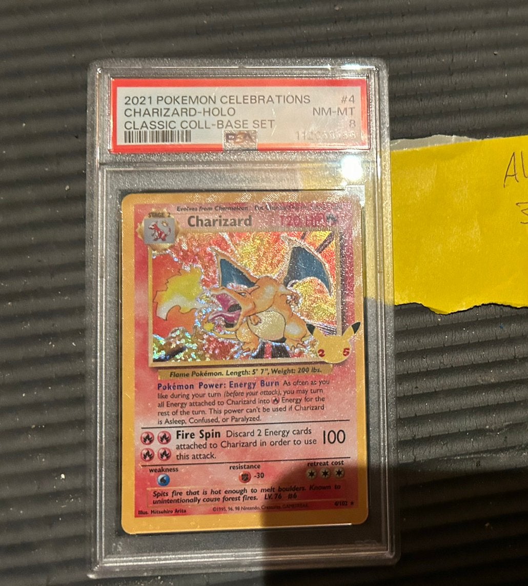 Charizard 4/102 celebrations nm psa 8 pokemon kaart, Ophalen of Verzenden, Zo goed als nieuw, Losse kaart, Foil