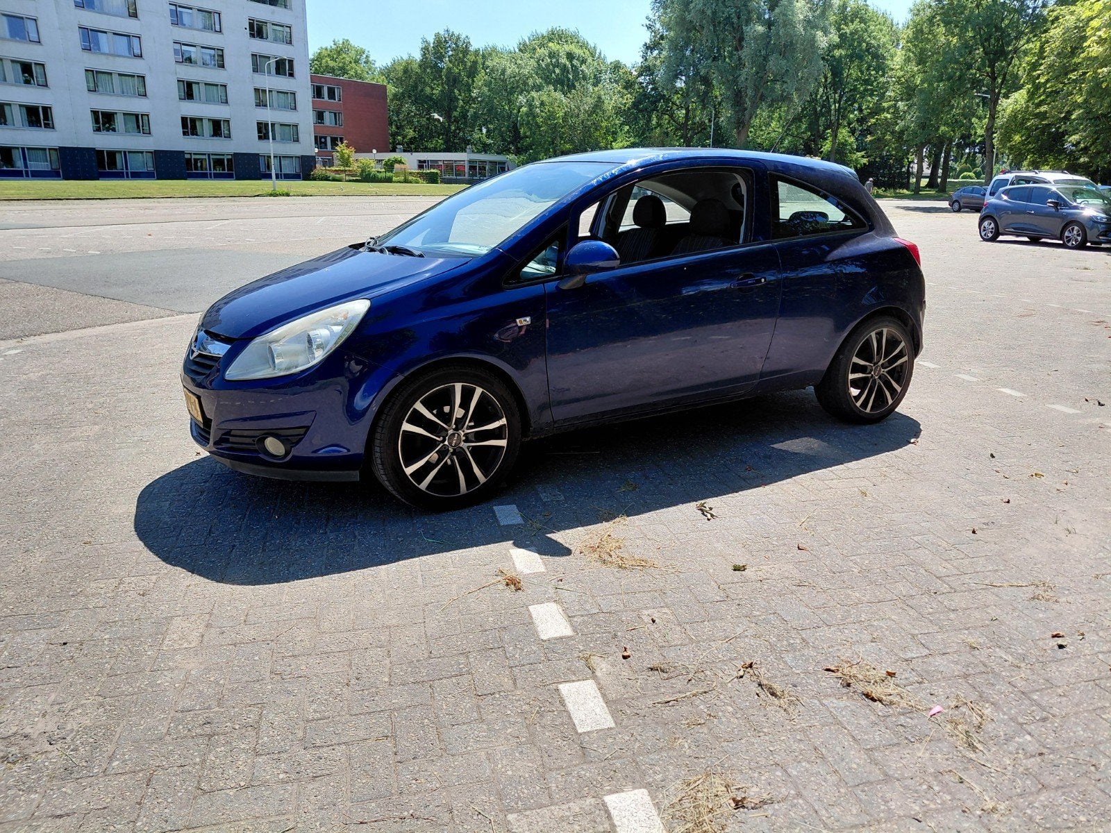Opel Corsa 1.2 16V 3D WR 2009 Blauw, Auto's, Voorwielaandrijving, 450 kg, 40 €/maand, Blauw