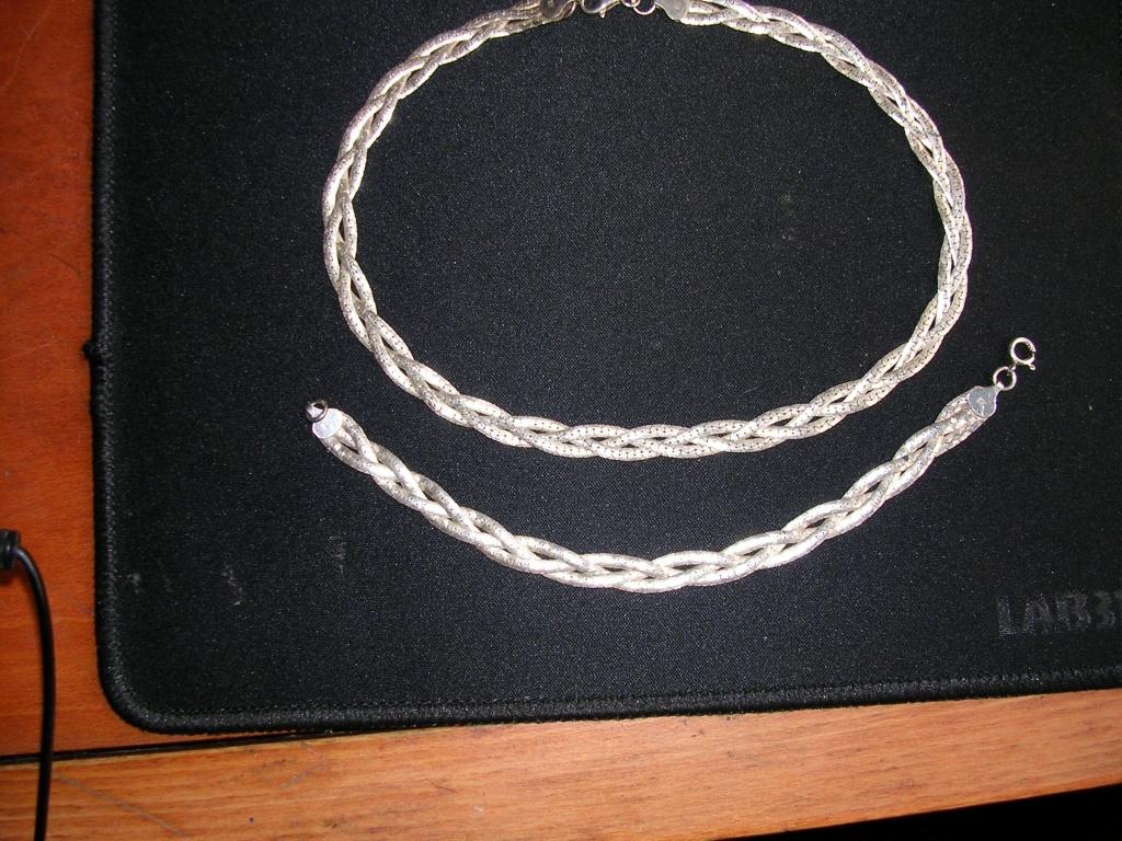 Zilveren ketting en een zilveren armband gemerkt met 925., Ophalen of Verzenden, Zilver, Ring