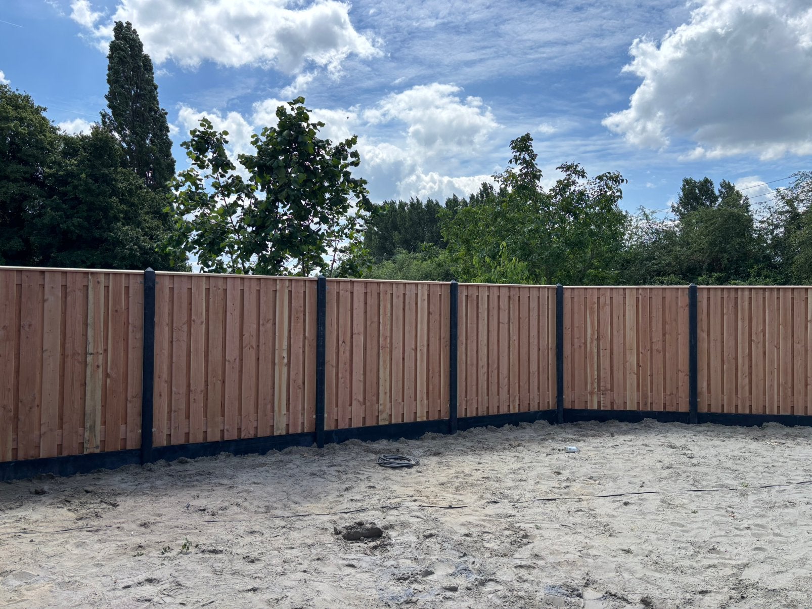 Douglas hout/beton schutting €130 per meter incl. Montage, Ophalen, 1 tot 2 meter, 6 meter of meer, Zo goed als nieuw