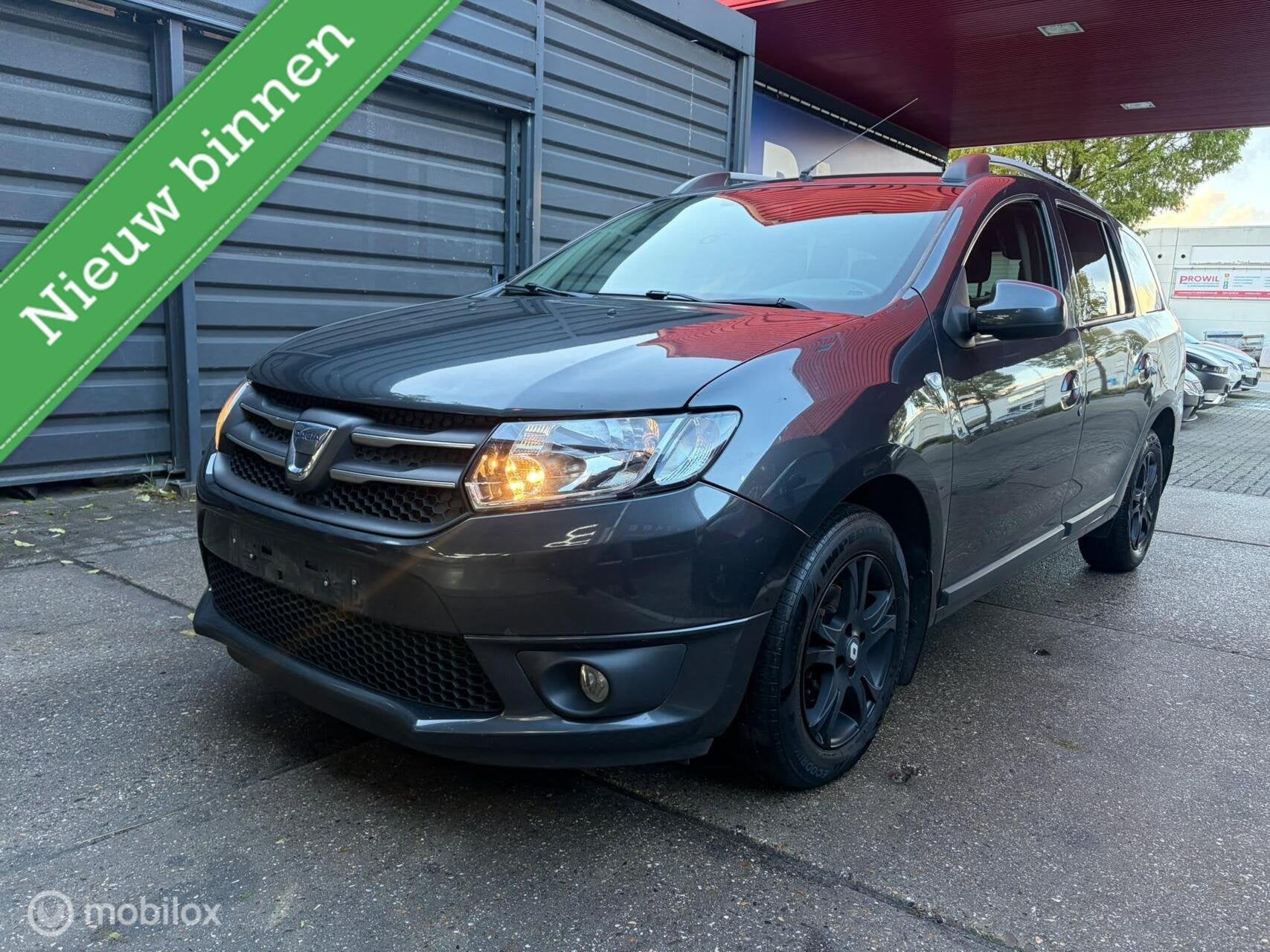 Dacia Logan MCV 0.9 TCe Laureate Automaat Trekhaak Cruise, Auto's, Stof, Origineel Nederlands, Bedrijf, 3 cilinders