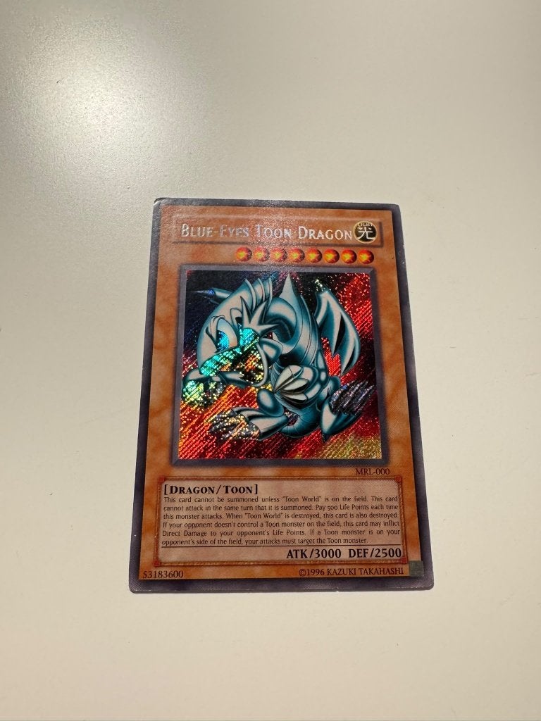 Blue Eyes Toon Dragon MRL - Near Mint - Yu Gi Oh, Ophalen, Zo goed als nieuw, Losse kaart