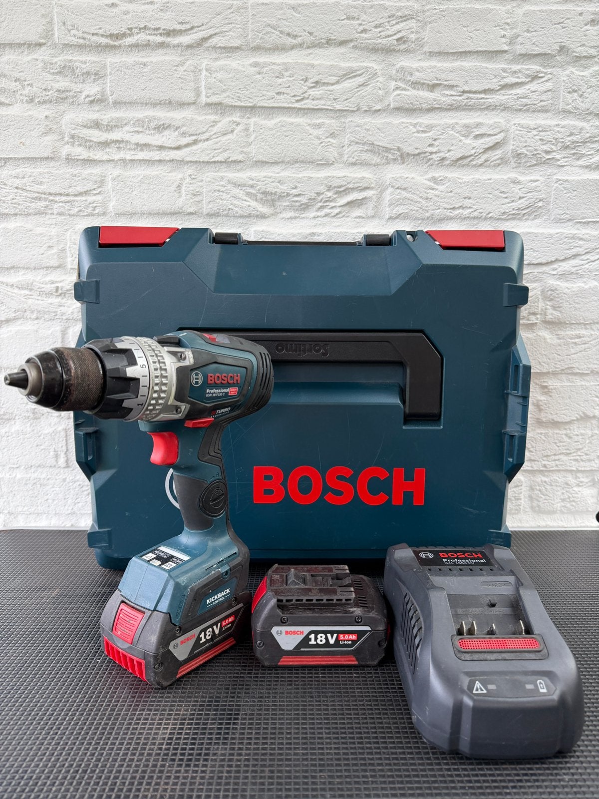 Bosch Professional GSR 18V-150C + 2x accu + oplader + koffer, Ophalen of Verzenden, Zo goed als nieuw, Boor- en Schroefmachine