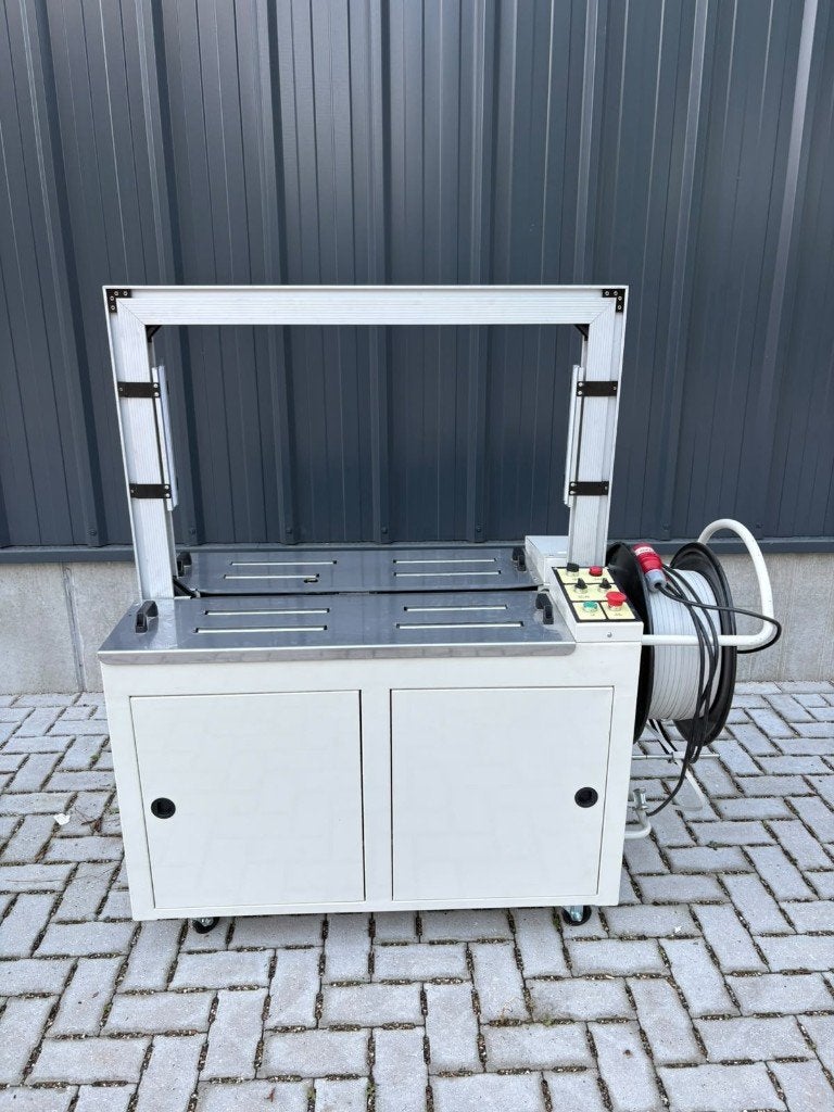 Nieuw Automatische Omsnoeringsmachine, Ophalen