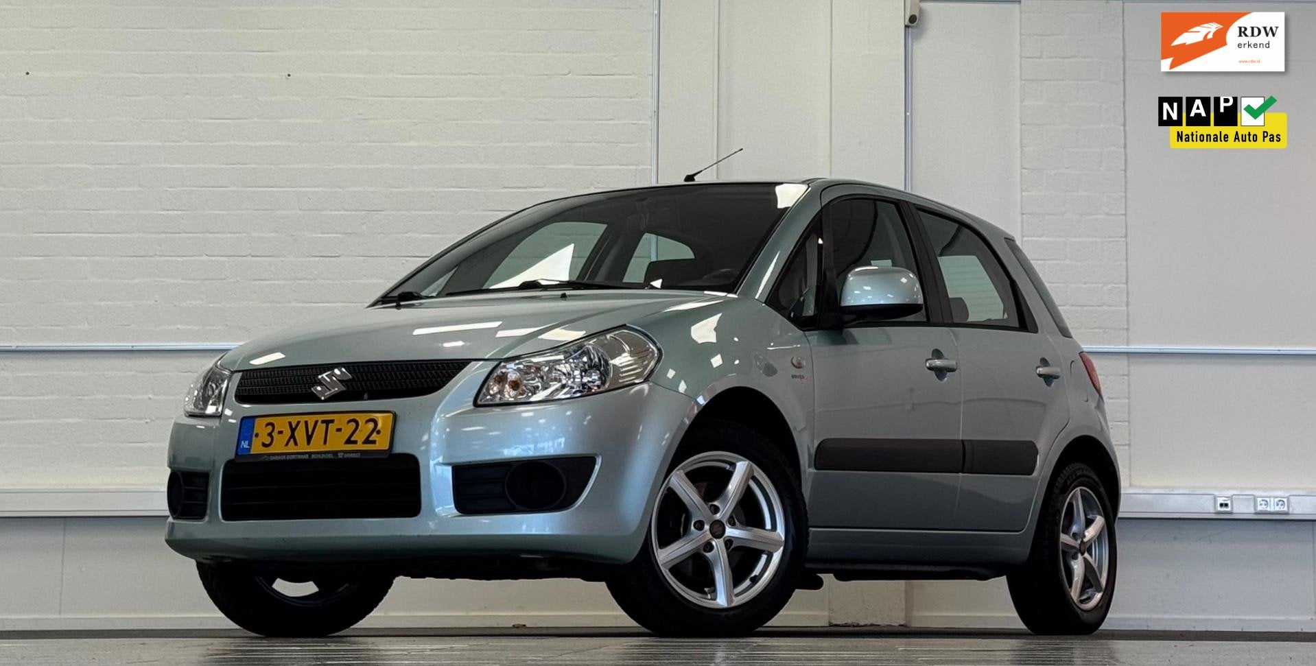 Suzuki SX4 1.5i 16V Comfort Trekhaak Airco Garantie, Auto's, Voorwielaandrijving, Gebruikt, Zwart, 4 cilinders