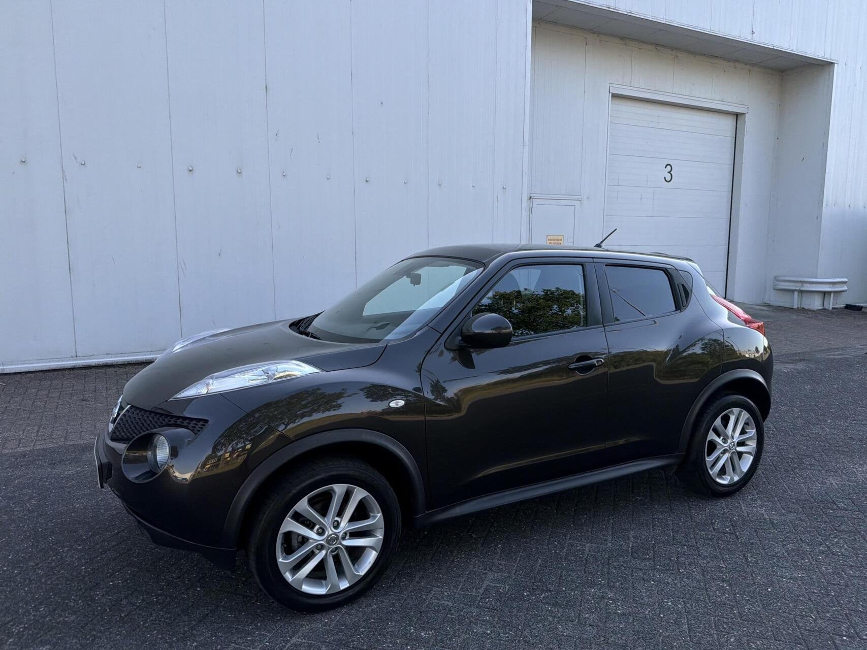 Nissan Juke 1.6 Acenta, Auto's, Euro 5, 4 cilinders, Bruin, Bedrijf