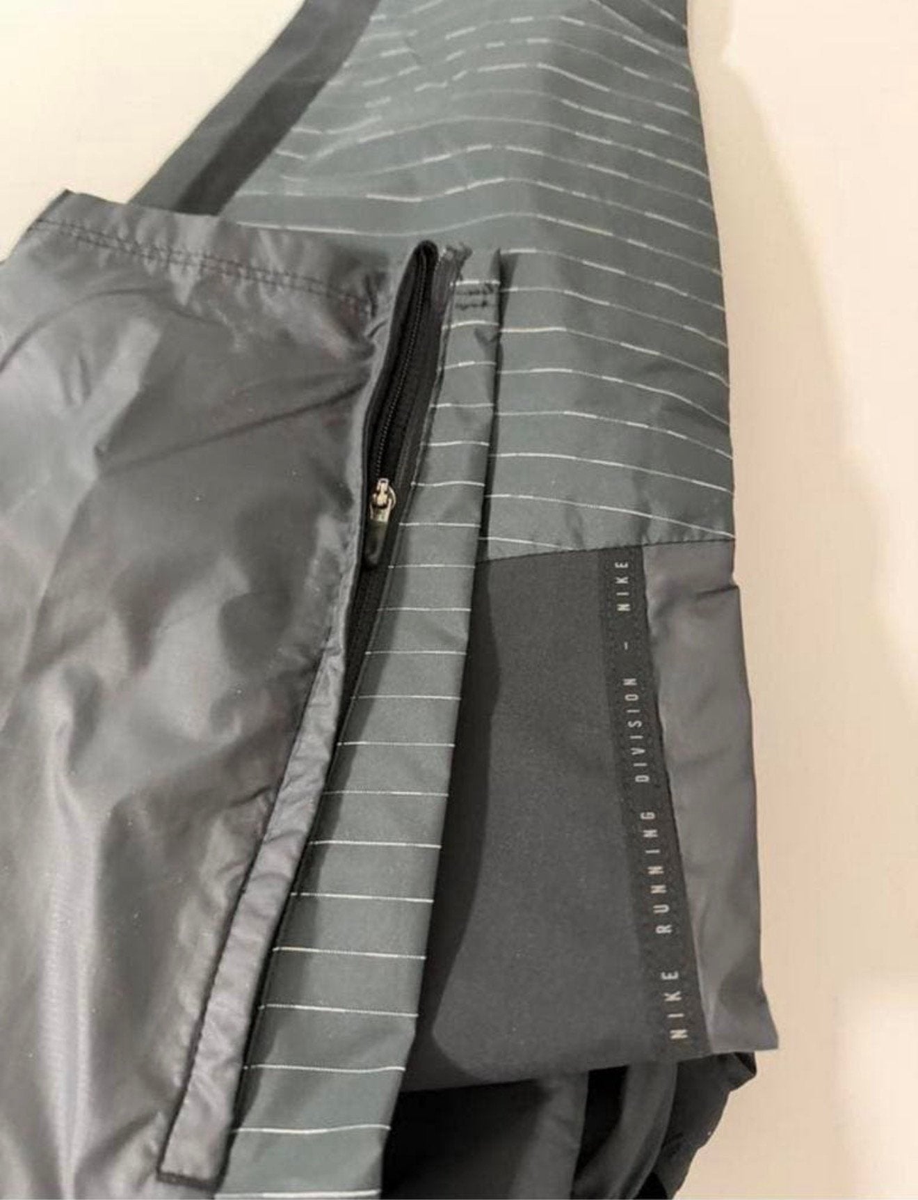 Nike Storm-FIT Running Division broek maat L waterproof zgan, Caravans en Kamperen, Regenbroek, Ophalen of Verzenden, Zo goed als nieuw