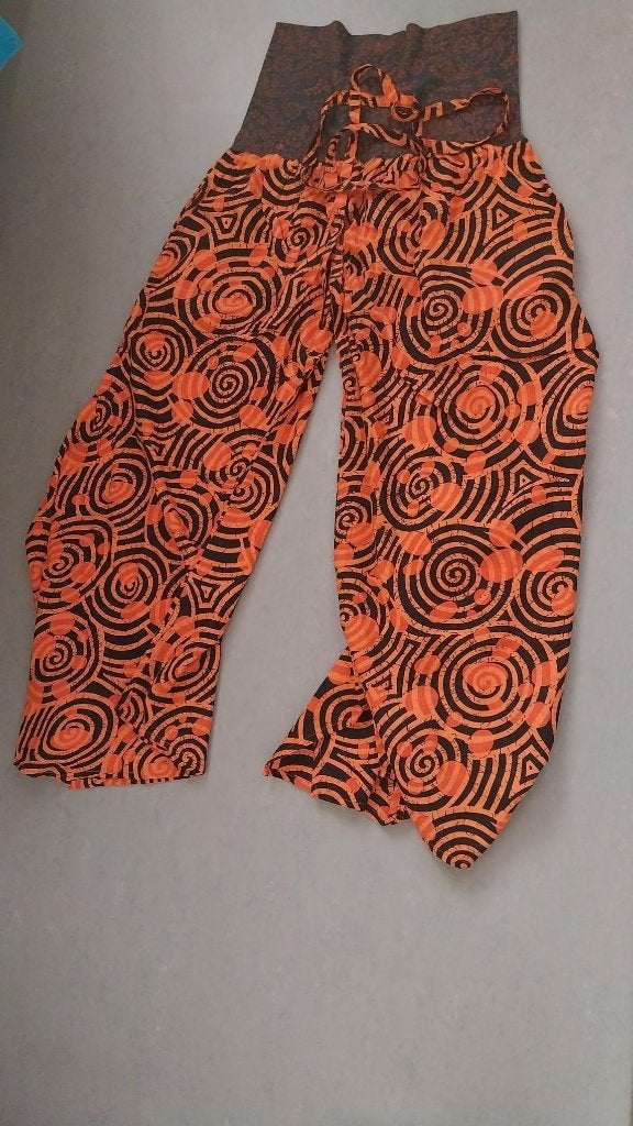 OPRUIMING nieuwe harembroek Pasal Himal oranje zwart L/XL, Zwart, Maat 46/48 (XL) of groter, Nieuw, Ophalen of Verzenden