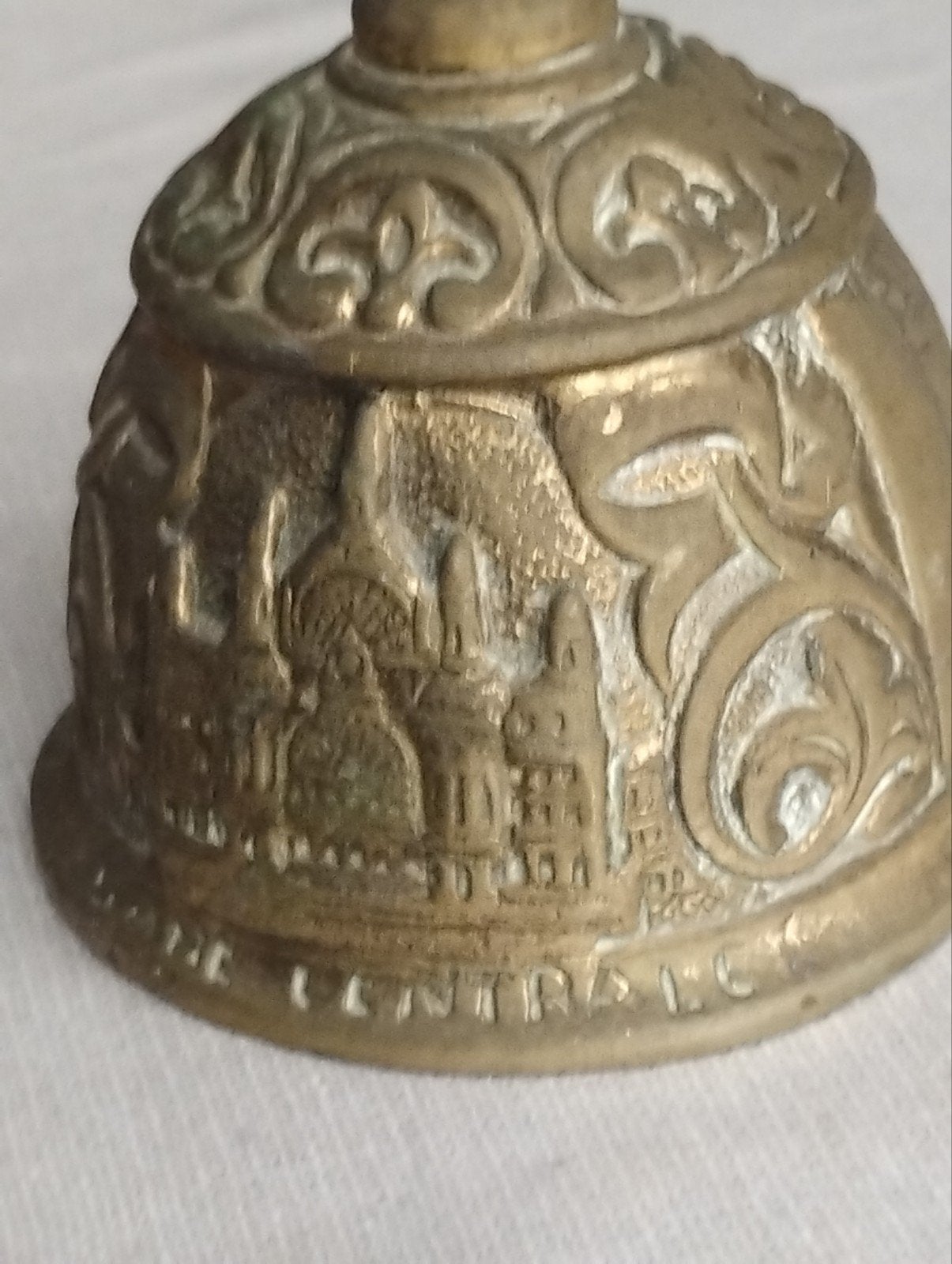 tafelbel oudje brons, Ophalen