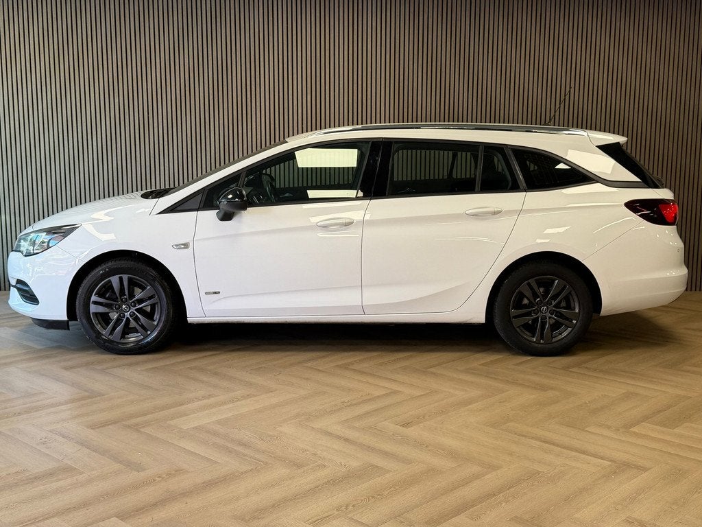 Opel Astra Sports Tourer 1.2 Design & Tech AIRCO APPLE CARPL, Auto's, Voorwielaandrijving, Stof, Gebruikt, Euro 6