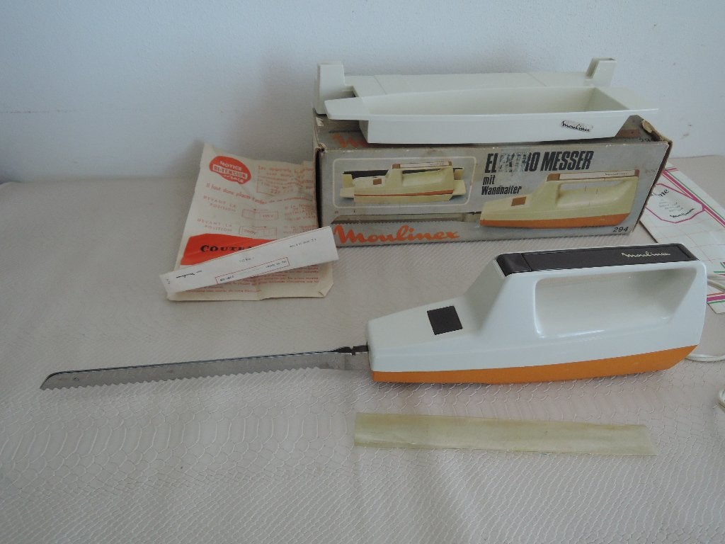 Moulinex elektrisch mes met wandhouder en handleiding, Ophalen of Verzenden, Zo goed als nieuw, Overige merken