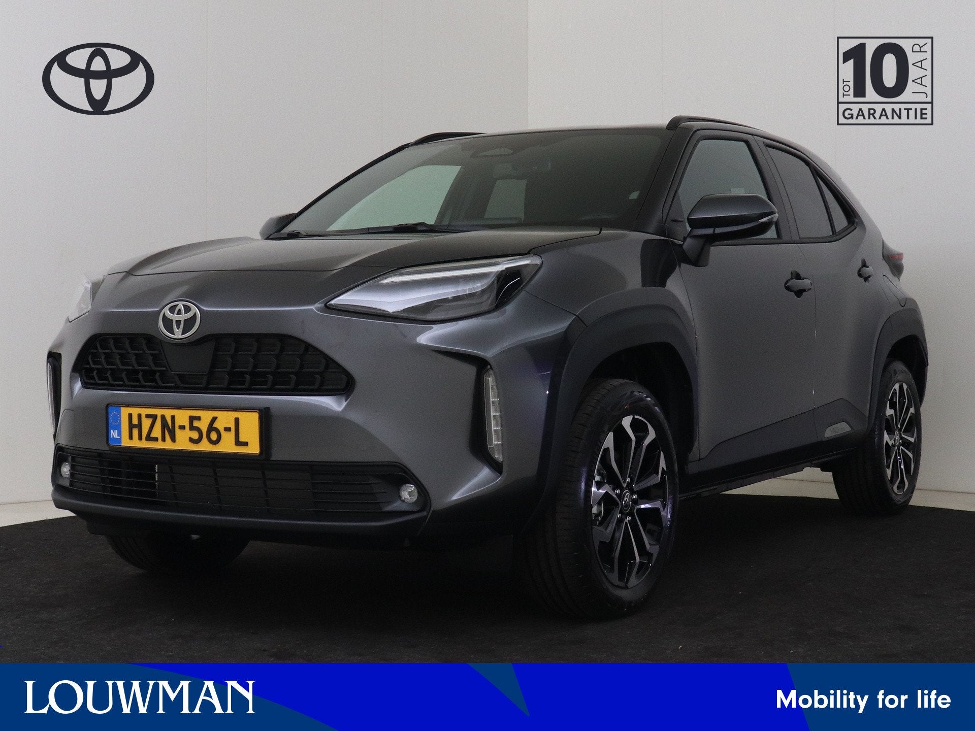 Toyota Yaris Cross 1.5 Hybrid 115 Dynamic (bj 2025), Auto's, 12 maanden, Stof, 116 pk, Bedrijf