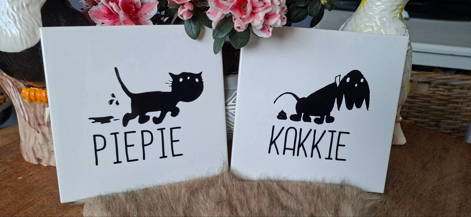 2x tegel 15x15 piepie en kakkie, Ophalen of Verzenden