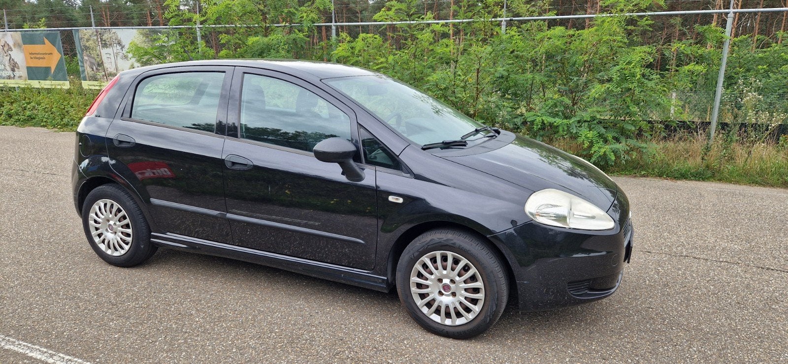 Fiat Grande Punto, 1.2 Actual DEALER OH|AIRCO|5 DRS|Lage KM!, Auto's, Fiat, 40 €/maand, 4 cilinders, Zwart, Origineel Nederlands