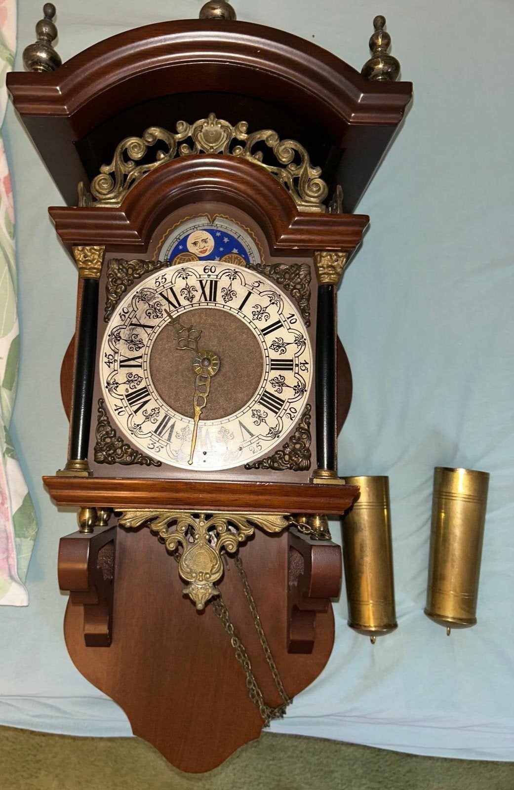 Wandklok/hangklok met gewichten, Ophalen