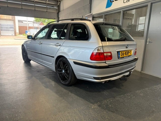 BMW 3-serie Touring 320i Leder|Cruise|Trekhaak, Auto's, 2171 cc, Achterwielaandrijving, Gebruikt, Handgeschakeld