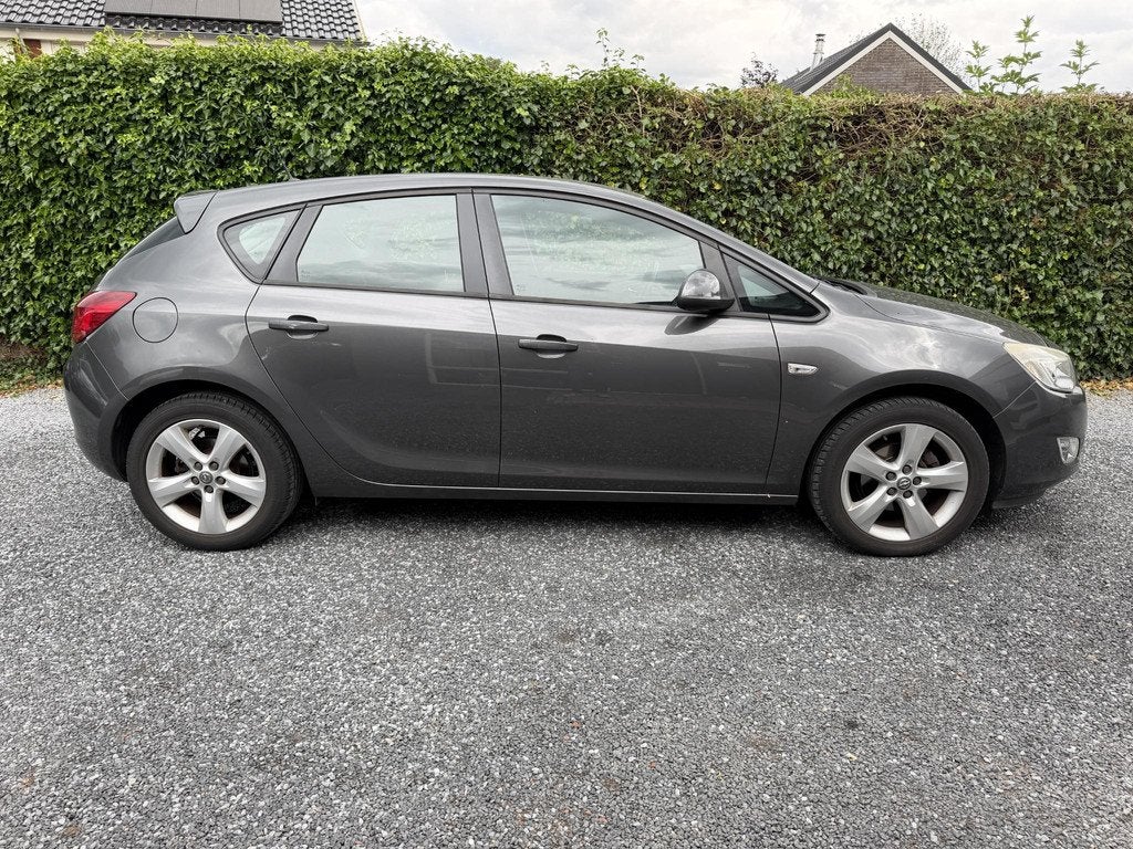 Opel Astra 1.4 Turbo Edition | Airco | Cruise Control | LMV, Auto's, Opel, Voorwielaandrijving, Euro 5, Stof, Gebruikt
