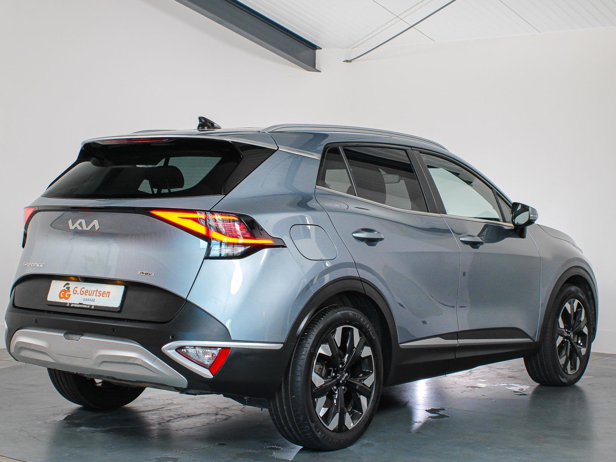 Kia Sportage 1.6 T-GDi Plug-in Hybrid AWD DynamicLine Camera, Auto's, Automaat, Gebruikt, 4 cilinders, Plug-in hybride