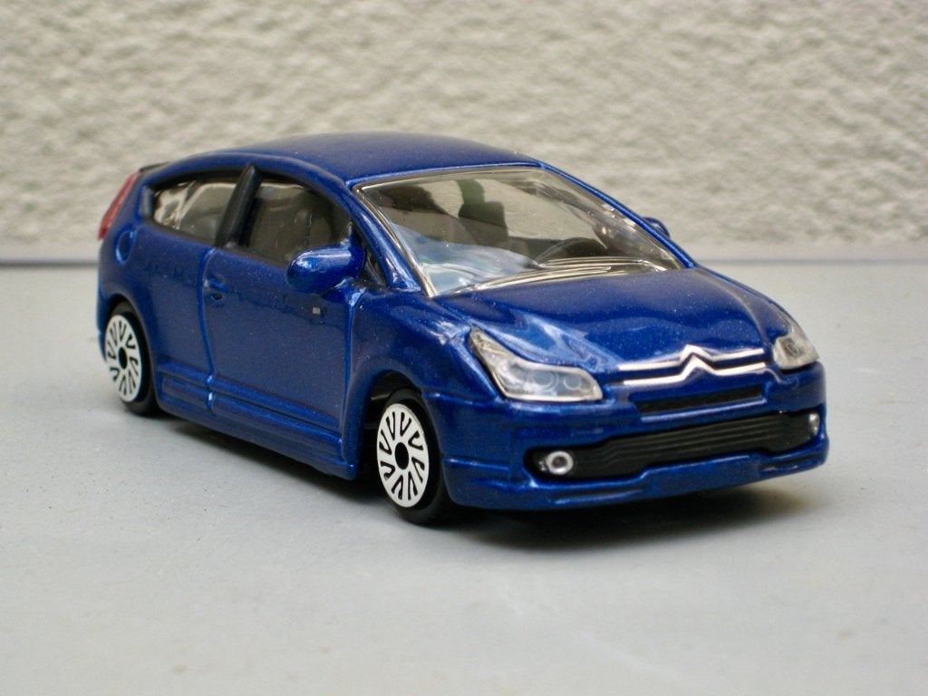 Citroen C4 coupé donkerblauw Burago 1:43, Ophalen of Verzenden, Nieuw, Auto, Overige merken