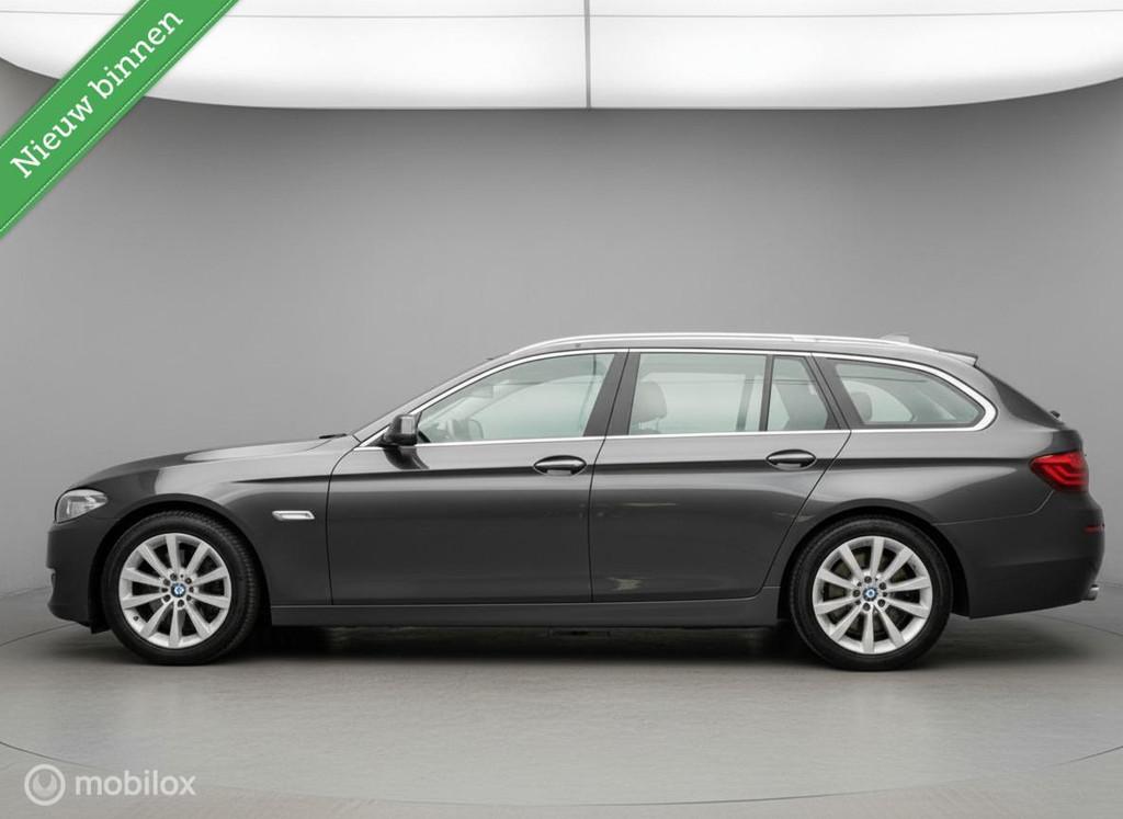BMW 5-serie Touring 528xi High Executive Aut Pano Leder NL A, Auto's, Automaat, 15 km/l, Gebruikt, Euro 6