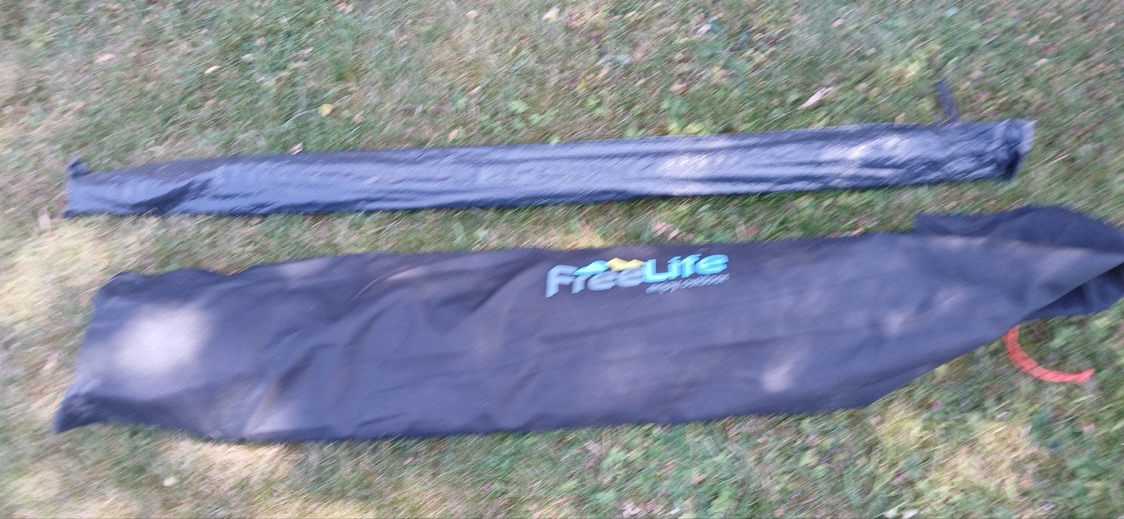 freelife zonneluifel 350x2.30  zgan vd caravan met stokken, Ophalen