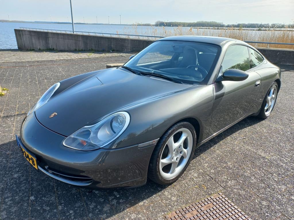 Porsche 911 Coupe Carrera 996 Grijs Schuifdak Dealer Ondh., Auto's, Porsche, Automaat, Achterwielaandrijving, 4 stoelen, 301 pk