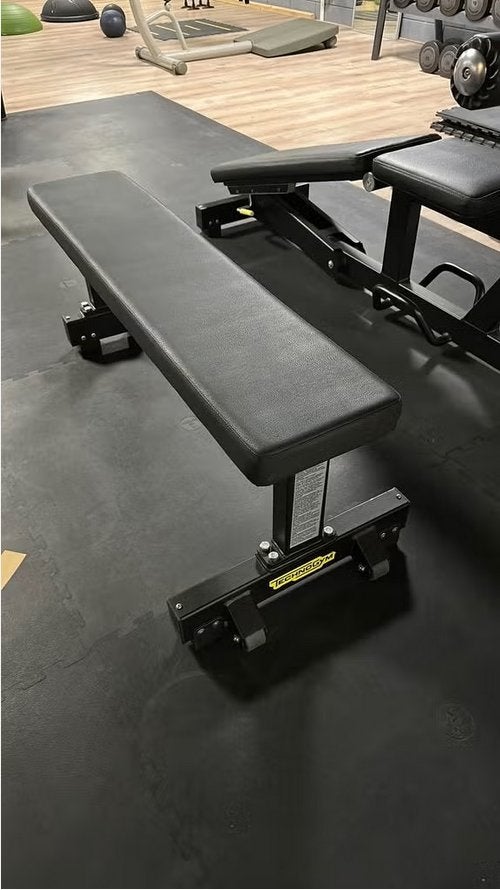 Technogym pure strength Flat bench, Ophalen of Verzenden, Zo goed als nieuw, Benen, Fitnessbank
