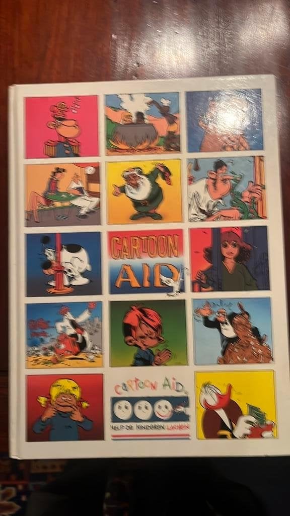 Dekker & Duncket  - HET CARTOON AID-BOEK, Eén stripboek, Ophalen of Verzenden, Gelezen