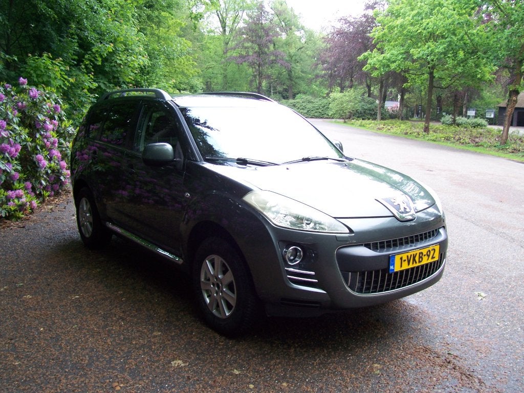 Peugeot 4007 Hdi Automaat GRIJS KENTEKEN  bouwjaar 2010, Auto's, Automaat, Euro 5, Zwart, 4 cilinders