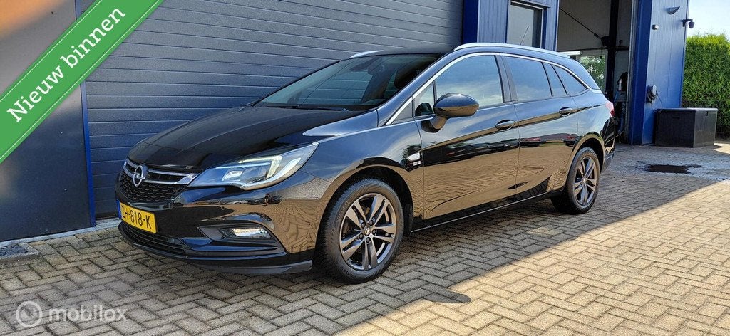 Opel Astra Sports Tourer 1.4 Turbo 120 Jaar Edition, Auto's, Opel, Gebruikt, 150 pk, Zwart, Origineel Nederlands
