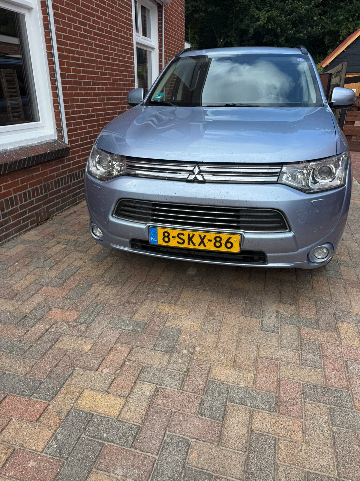 Mitsubishi Outlander 2.0 Dohc Mivec Phev 203pk 4WD CVT 5P, 1998 cc, Zwart, 4 cilinders, Blauw