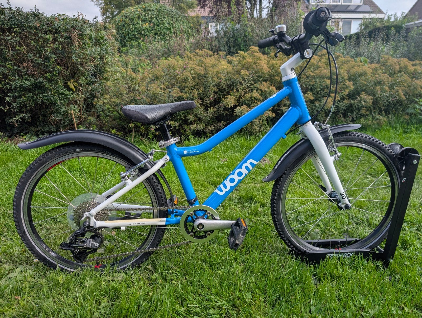 Woom 4 kinderfiets - 20 inch nette staat, Ophalen, 20 inch of meer, Gebruikt, Velgrem
