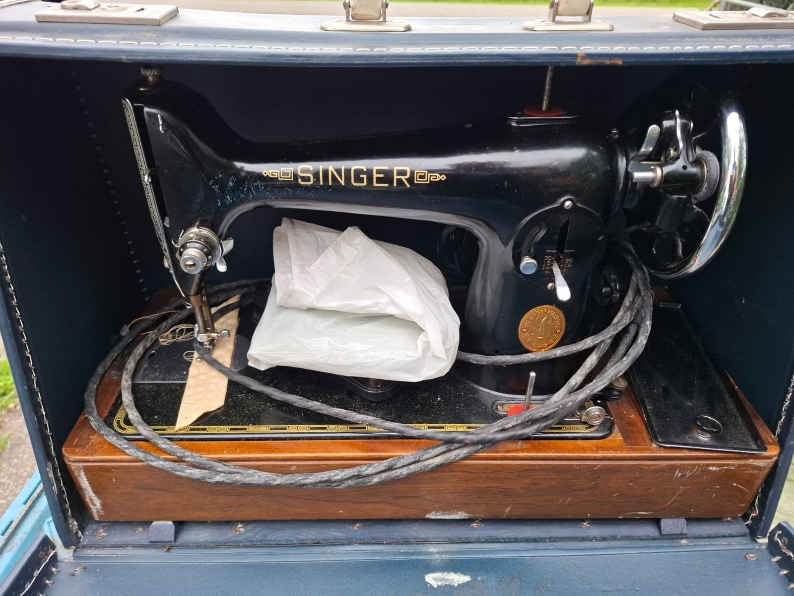 Singer naaimachine, Ophalen