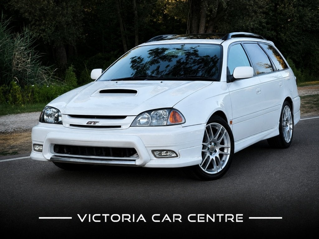 Toyota Caldina GT-T 3S-GTE / 4WD - handgeschakeld (bj 2001), Auto's, 1998 cc, Stof, 259 pk, Wit