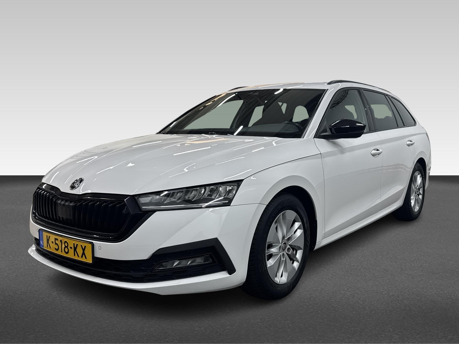 Skoda Octavia Combi 1.0 e-TSI Sport Business, Auto's, Gebruikt, Euro 6, Wit, 19 km/l