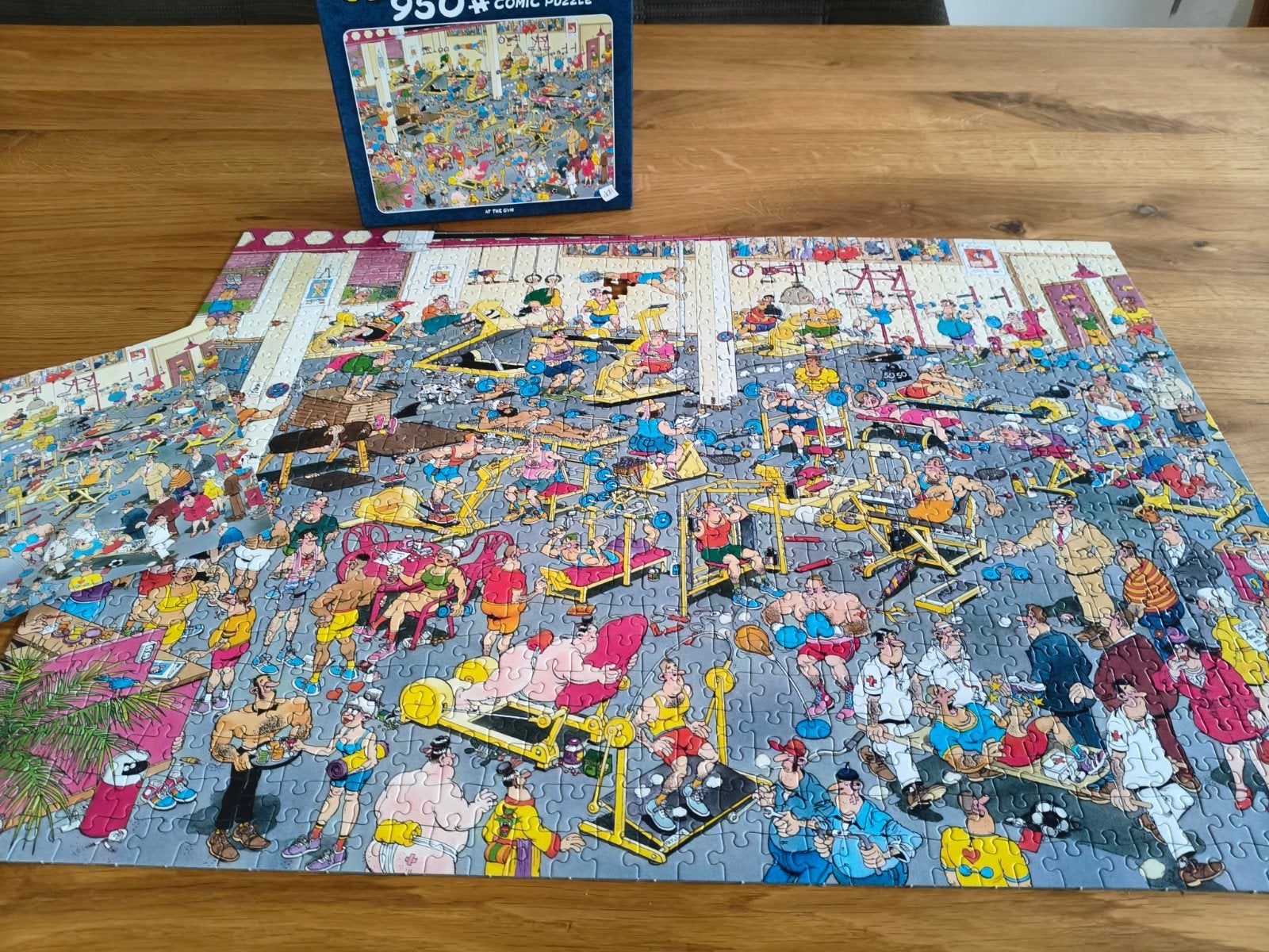 Jan van Haasteren puzzel - At The Gym (950+ stukjes), Ophalen of Verzenden, Zo goed als nieuw, Jumbo