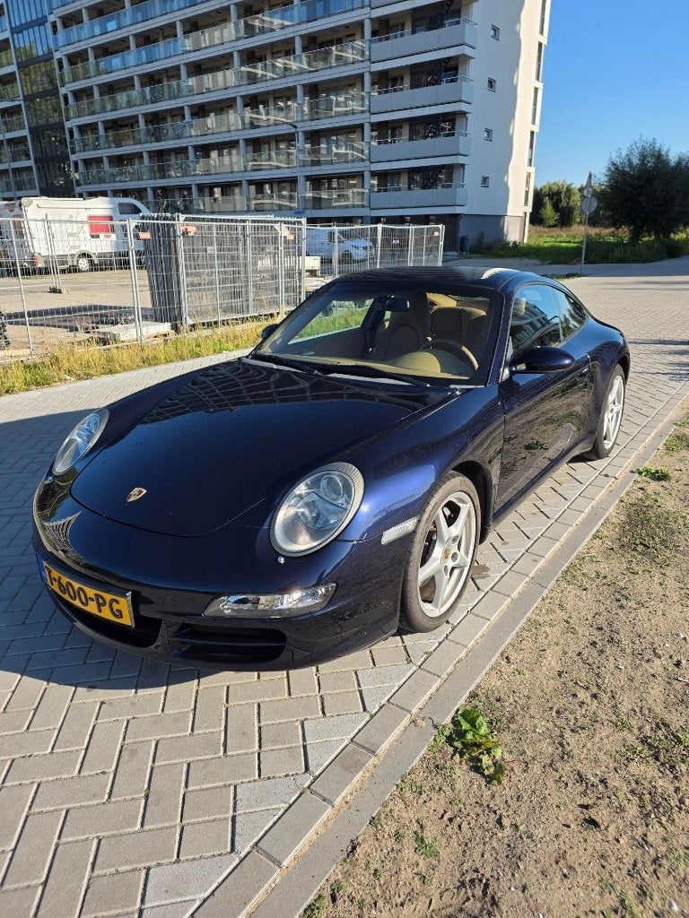 Porsche 911 997 Coupe Carrera 2008 Blauw, Auto's, Automaat, Dealer onderhouden, Achterwielaandrijving, Beige